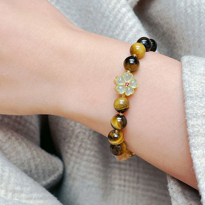 Bracelet Foviel à perles de fleur et clochette en œil de tigre naturel et citrine pour le courage