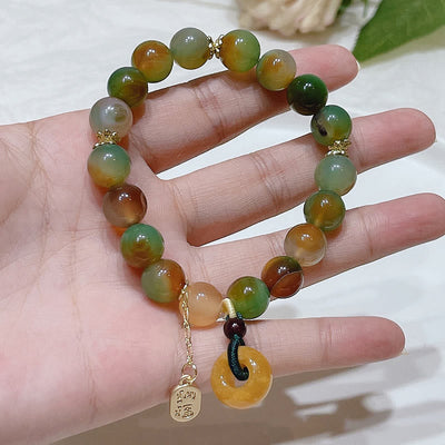Bracelet d'équilibre Nafu avec boucle de paix en agate paon et topaze Foviel