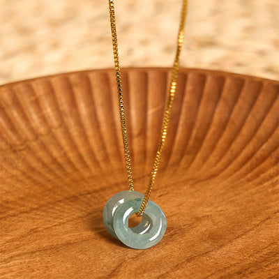 Pendentif de collier prospérité double boucle de paix en jade Foviel