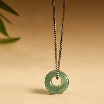 Pendentif de collier prospérité double boucle de paix en jade Foviel