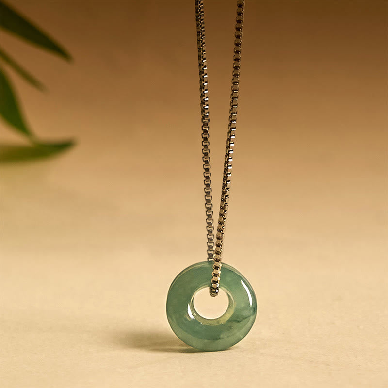 Pendentif de collier prospérité double boucle de paix en jade Foviel