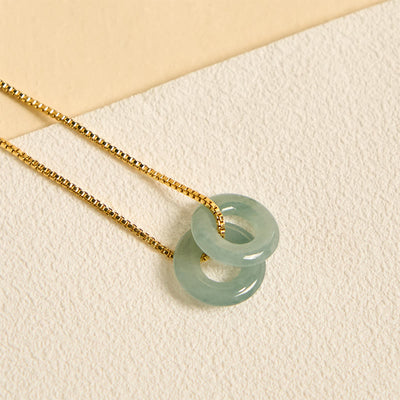 Pendentif de collier prospérité double boucle de paix en jade Foviel