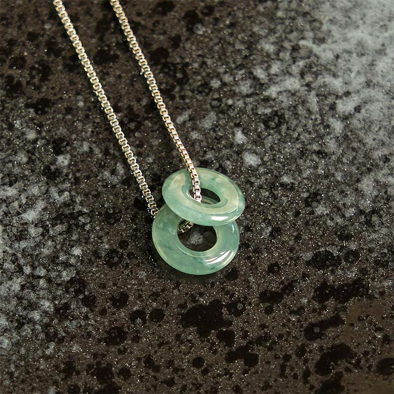 Pendentif de collier prospérité double boucle de paix en jade Foviel