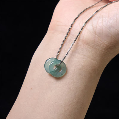 Pendentif de collier prospérité double boucle de paix en jade Foviel