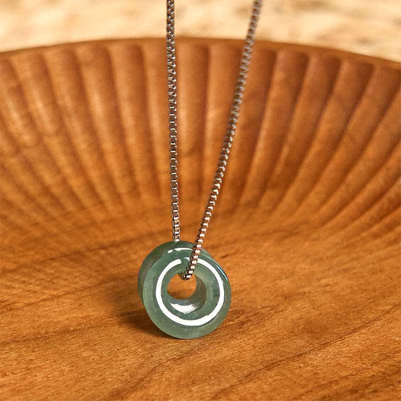 Pendentif de collier prospérité double boucle de paix en jade Foviel