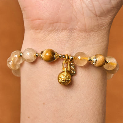 Bracelet Foviel en quartz rutile naturel avec caractère Fu et motif de bête avaleuse de métal porte-bonheur