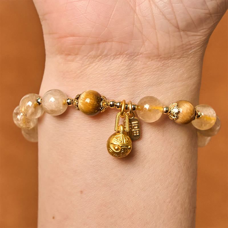 Bracelet Foviel en quartz rutile naturel avec caractère Fu et motif de bête avaleuse de métal porte-bonheur
