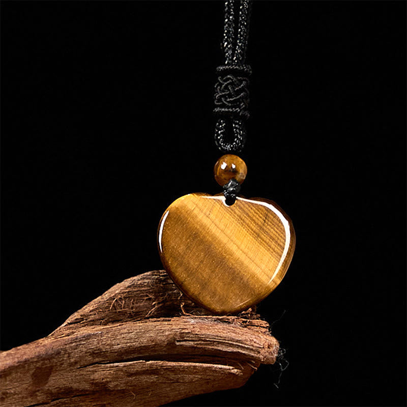 Pendentif collier en corde avec motif cœur en œil de tigre naturel Foviel pour la protection