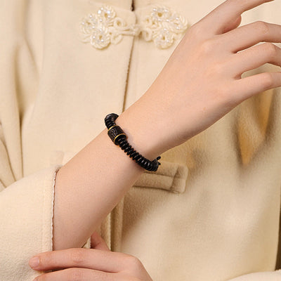 Bracelet porte-bonheur Foviel en coquille de noix de coco tibétaine, motif nuages de bon augure