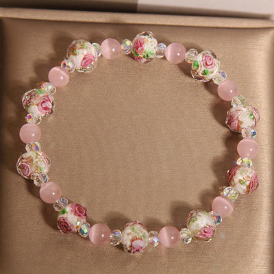 Foviel Rosa Kristall Liuli Glasperlen Katze Auge Wärme Armband
