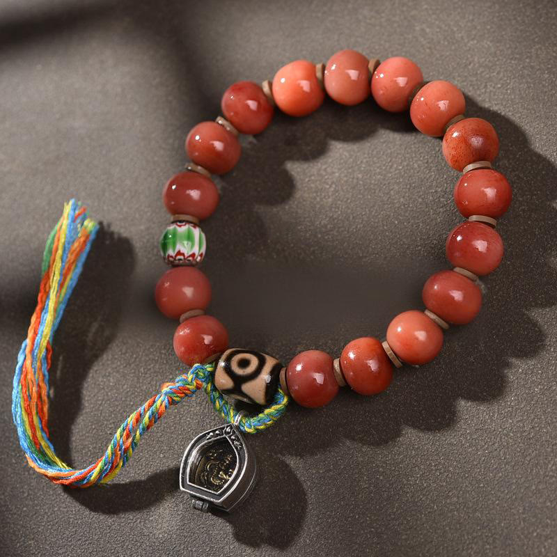 Bracelet porte-bonheur Foviel vintage à pompon en os de chameau tibétain