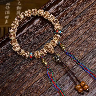 Foviel Tibetan Camel Bone Garuda Carved Protection Tassel Bracelet