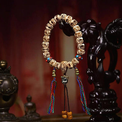 Foviel Tibetan Camel Bone Garuda Carved Protection Tassel Bracelet