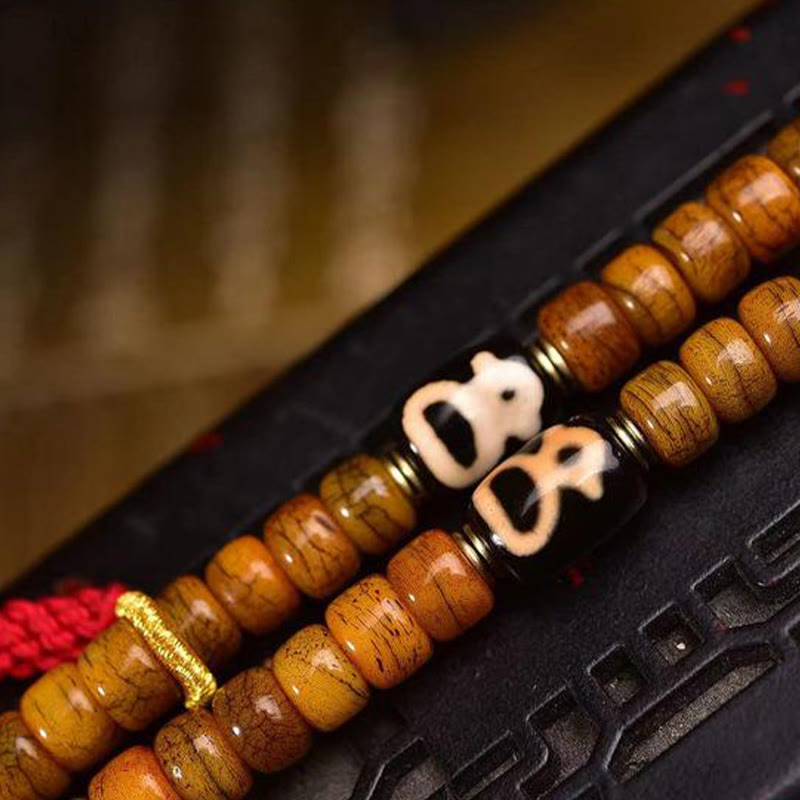Mala Foviel tibétain de 108 perles en os de chameau avec pompon porte-bonheur