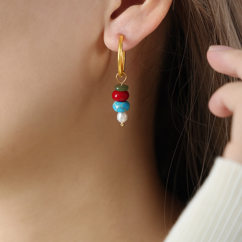Boucles d'oreilles Foviel en acier titane avec perles en agate rouge naturelle et design de pierre Marnyi tibétaine, symbole de confiance
