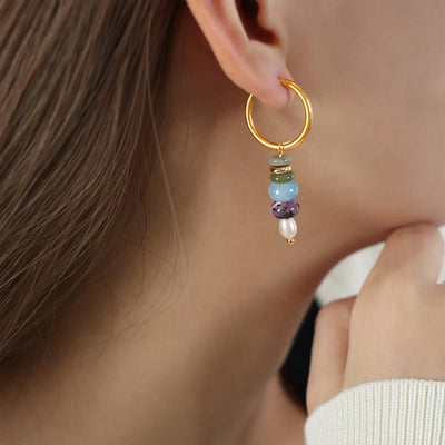 Boucles d'oreilles Foviel en acier titane avec perles en agate rouge naturelle et design de pierre Marnyi tibétaine, symbole de confiance