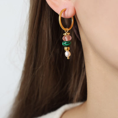 Boucles d'oreilles Foviel en acier titane avec perles en agate rouge naturelle et design de pierre Marnyi tibétaine, symbole de confiance