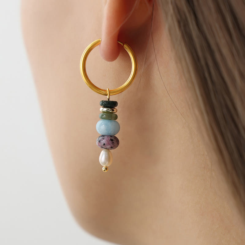 Boucles d'oreilles Foviel en acier titane avec perles en agate rouge naturelle et design de pierre Marnyi tibétaine, symbole de confiance