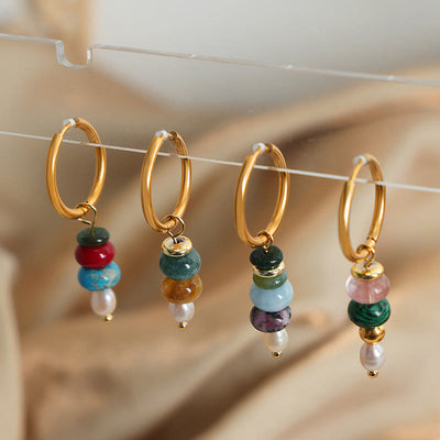 Boucles d'oreilles Foviel en acier titane avec perles en agate rouge naturelle et design de pierre Marnyi tibétaine, symbole de confiance
