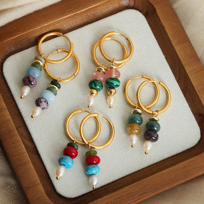 Boucles d'oreilles Foviel en acier titane avec perles en agate rouge naturelle et design de pierre Marnyi tibétaine, symbole de confiance