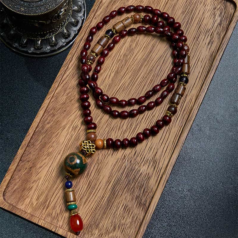 Pendentif de collier Foviel en bois de wengé fait main avec perle Dzi de protection et tête d'éléphant