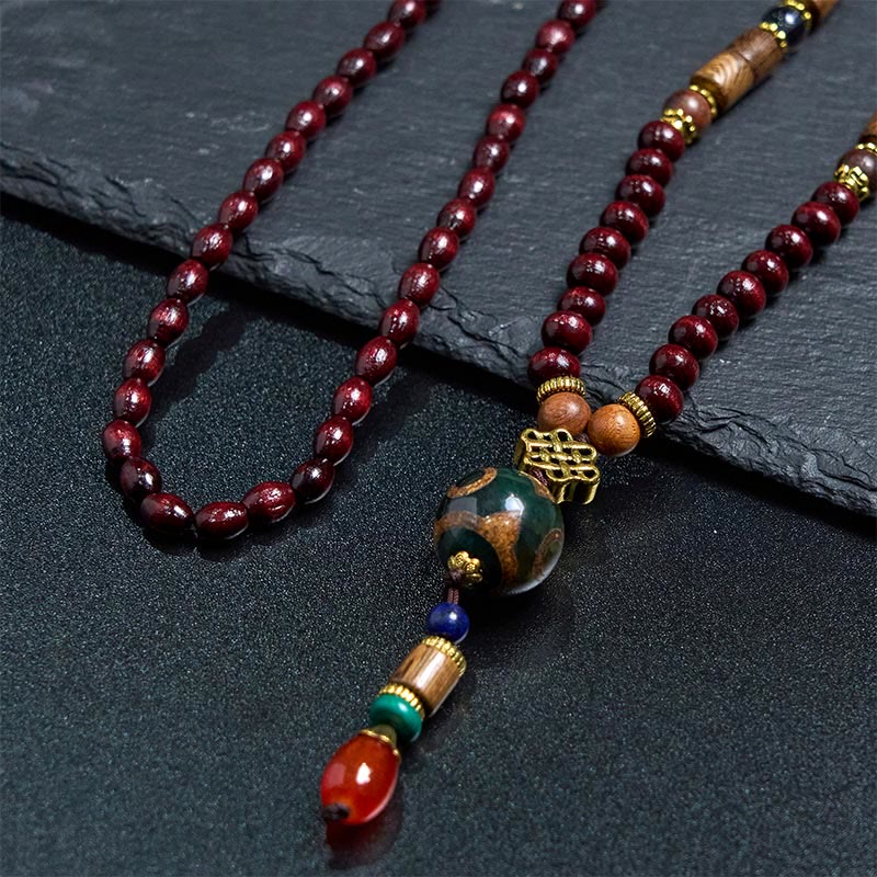 Pendentif de collier Foviel en bois de wengé fait main avec perle Dzi de protection et tête d'éléphant
