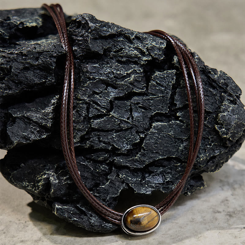 Pendentif collier Foviel en forme d'ellipse en œil-de-tigre naturel avec cordon ciré de protection