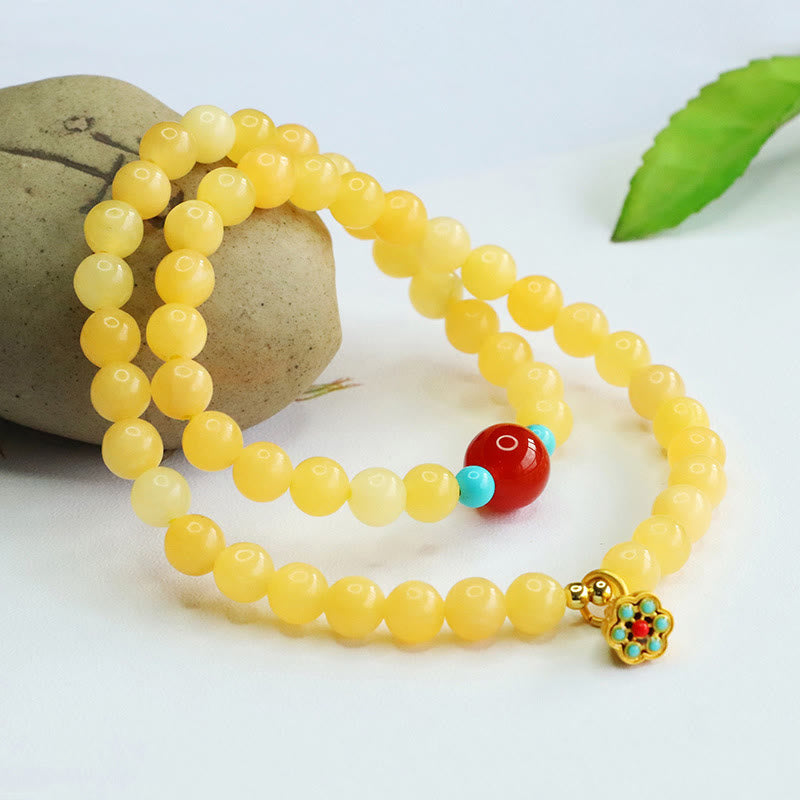 Bracelet porte-bonheur Foviel en perles d'agate rouge topaze