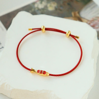 Bracelet de richesse Foviel en laiton avec cordon rouge et motif de poisson koï