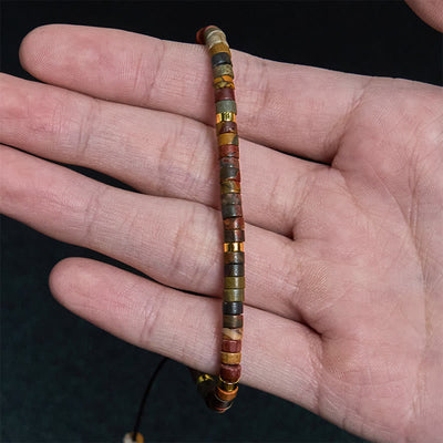 Bracelet de perles intercalaires Foviel en rhodonite pour guérir les relations