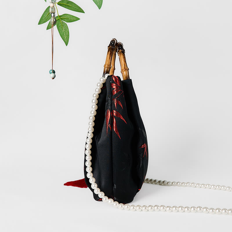 Sac bandoulière Foviel en polyester et coton brodé de feuilles avec anse en bambou et perles