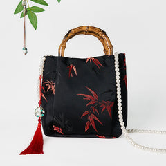 Sac bandoulière Foviel en polyester et coton brodé de feuilles avec anse en bambou et perles