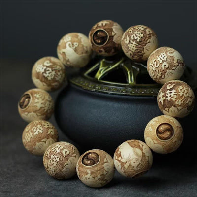 Foviel Camphor Wood Yin Yang Ox Graviertes Armband mit glanzvollen Farben
