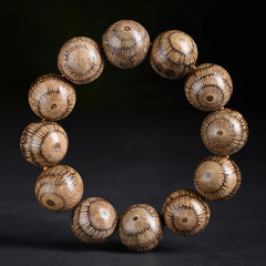 Bracelet de protection en perles de bois de Gnetum Foviel