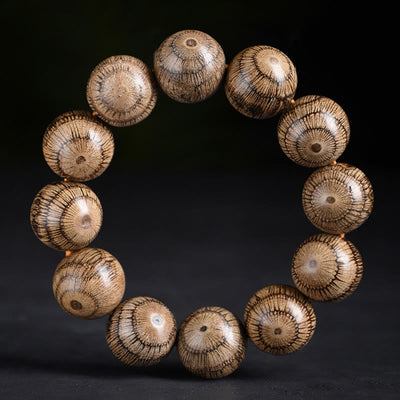 Bracelet de protection en perles de bois de Gnetum Foviel