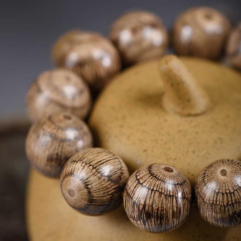 Bracelet de protection en perles de bois de Gnetum Foviel