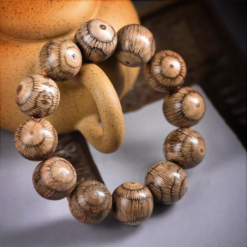 Bracelet de protection en perles de bois de Gnetum Foviel
