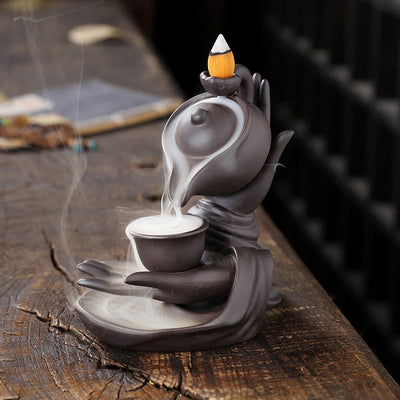 Buddha Stones Buddha Hand Holding Teapot Cup Ceramic Backflow Smoke Fountain Healing Incense Burner Decoration - Brown Black 13.7*9*13.9cm - image 1