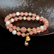 Bracelet double tour de guérison Foviel avec perles en quartz fraise naturel et clochette