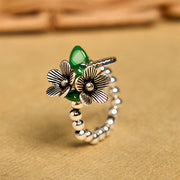 Foviel Blumenmuster Kupferlegierung Glück elastischer Seilring