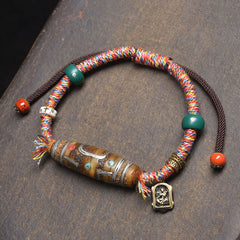 Buddha Stones Handcrafted Tibetan Nine-eye Dzi Bead Protection Rope Bracelet - Colored Ropes & Nine-Eye Dzi Bead (Wrist Circumference: 16-20cm) - image 0