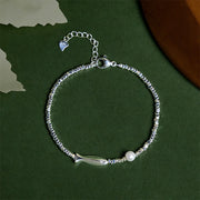 Bracelet chance Foviel en argent plaqué cuivre orné d'une perle en forme de poisson koï