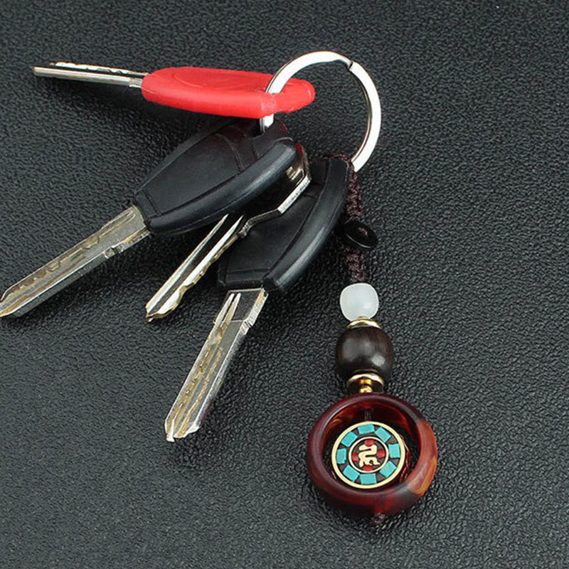 Buddha Stones Ebony Wood Sanskrit Four-leaf Clover Buddha's Eye Peace Rotatable Key Chain - image 3