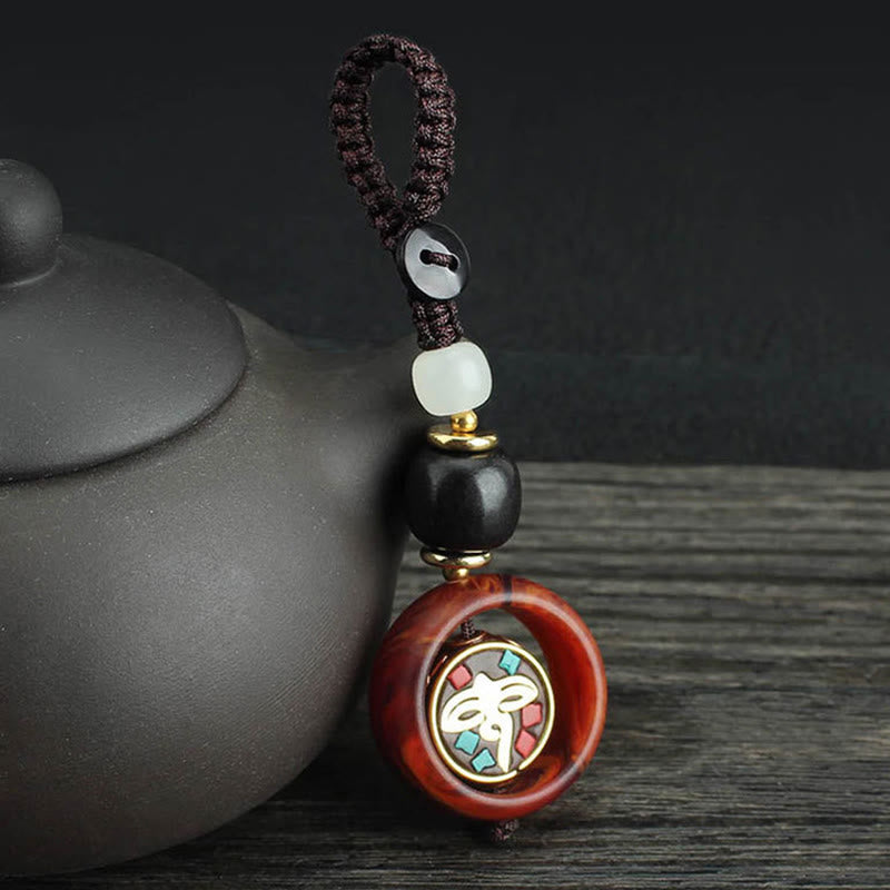 Buddha Stones Ebony Wood Sanskrit Four-leaf Clover Buddha's Eye Peace Rotatable Key Chain - Buddha's Eye Pattern - image 6