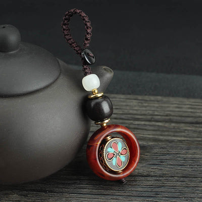 Buddha Stones Ebony Wood Sanskrit Four-leaf Clover Buddha's Eye Peace Rotatable Key Chain - Four-leaf Clover Pattern - image 8