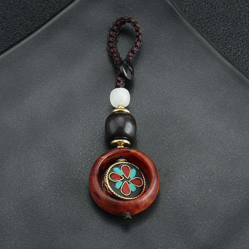 Buddha Stones Ebony Wood Sanskrit Four-leaf Clover Buddha's Eye Peace Rotatable Key Chain - image 9