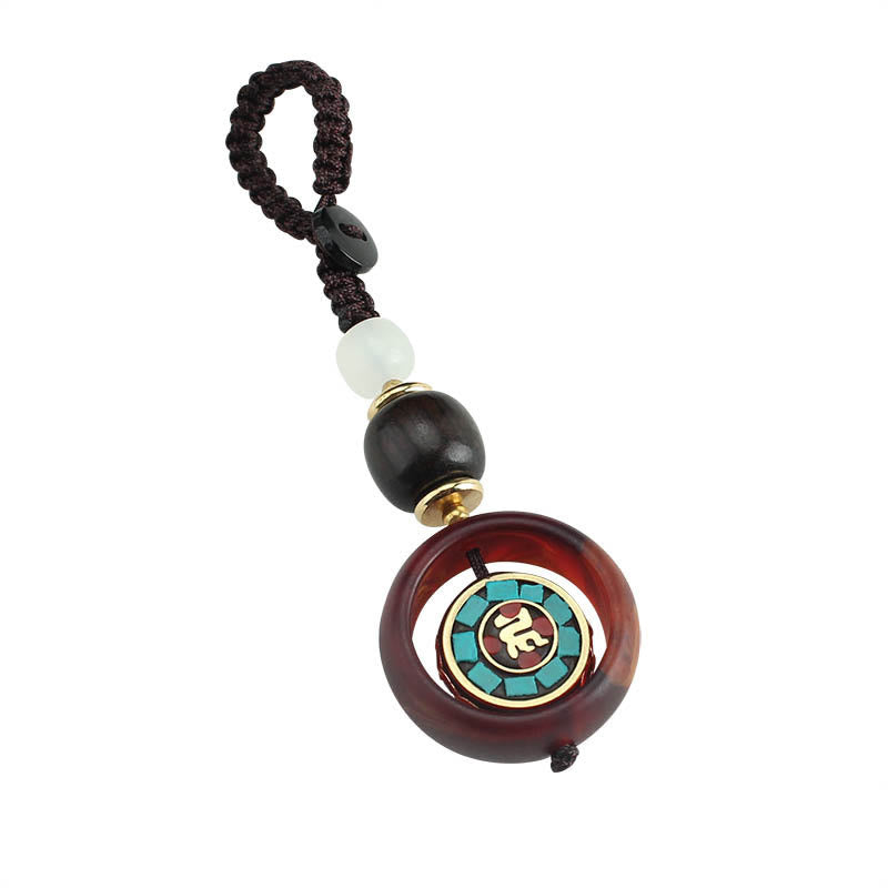 Buddha Stones Ebony Wood Sanskrit Four-leaf Clover Buddha's Eye Peace Rotatable Key Chain - image 4