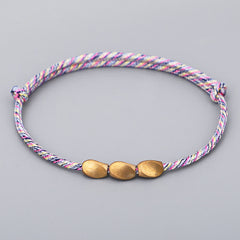 Buddha Stones Multiple Colors String Golden Copper Beads Balance Bracelet - Light Pink - image 0