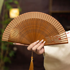 Buddha Stones Inspired Hollow Carved Bamboo Tassel Simple Folding Fan - Brown - image 0
