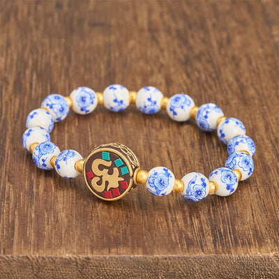 Buddha Stones Blue and White Porcelain Copper OM Compassion Beads Bracelet - image 1